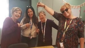 Principal & Teachers Suspended After Photo Show Women Laughing & Holding A Noose